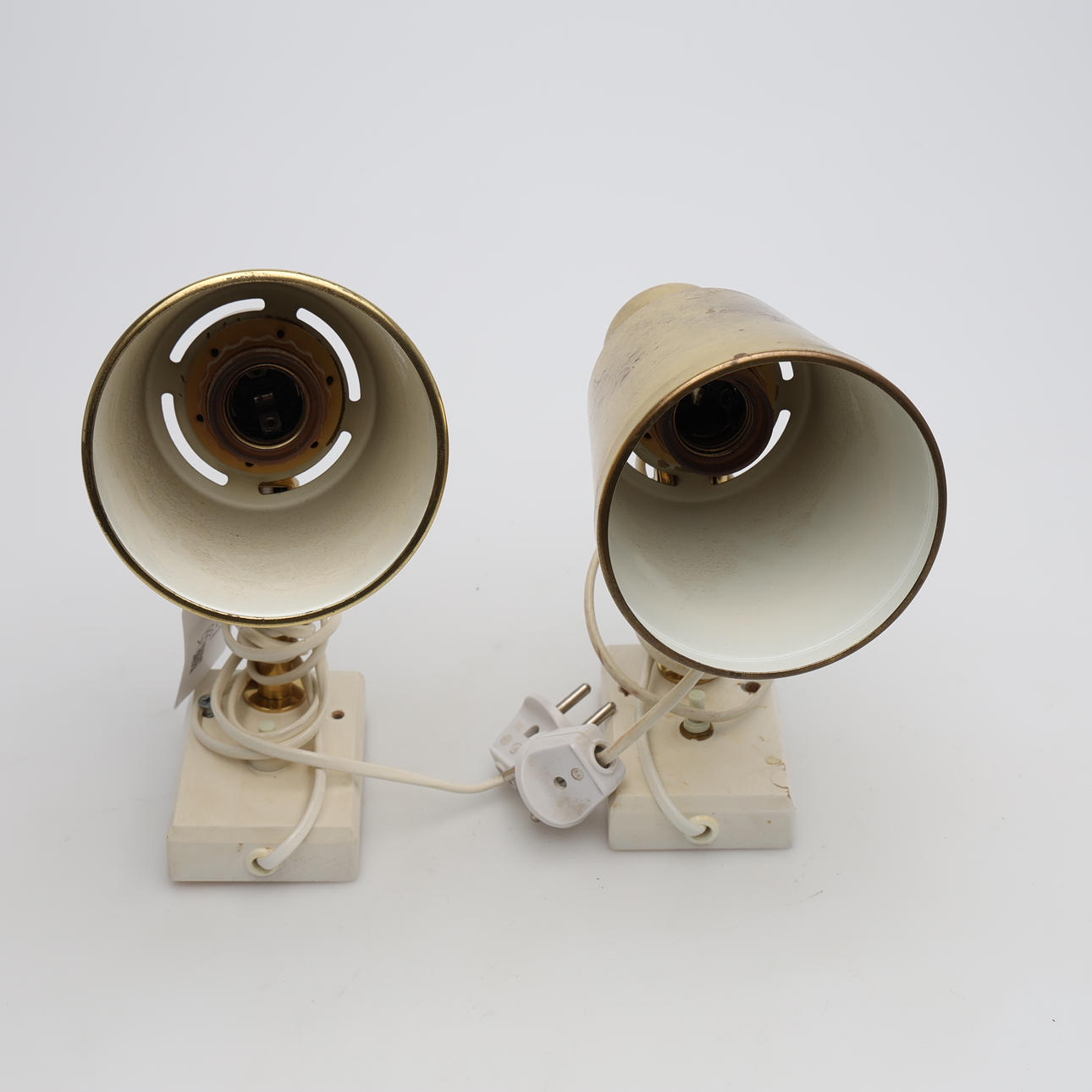 WALL LAMPS, A pair, marked “BJS 34".