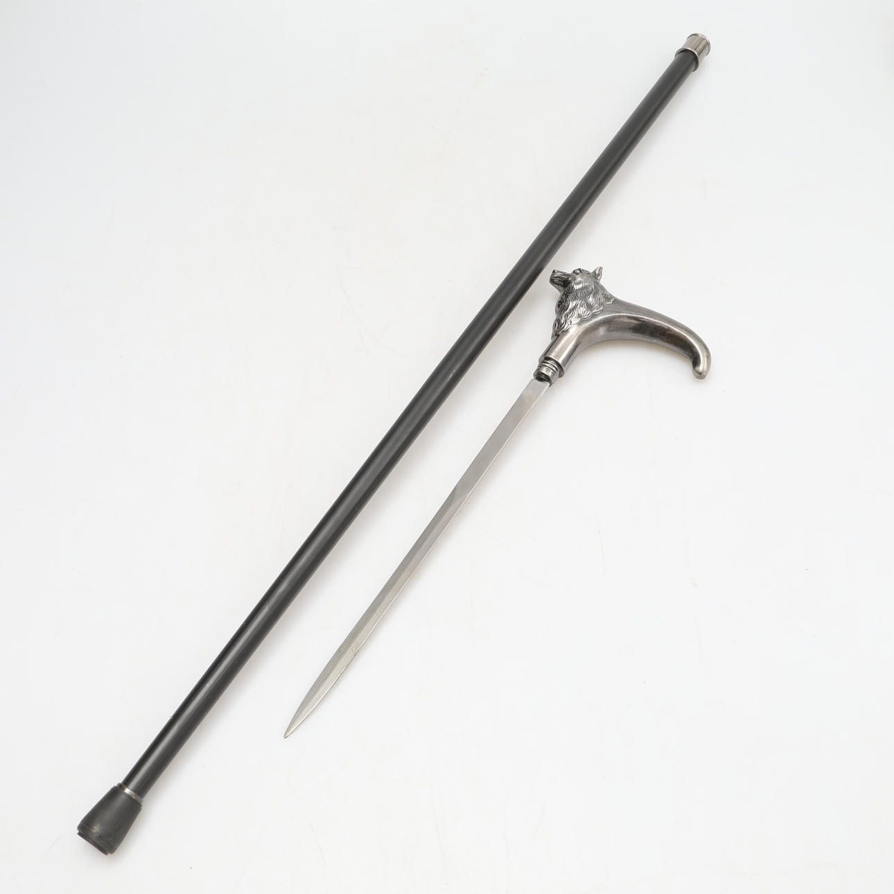 SWORDSTICK, wolf head.