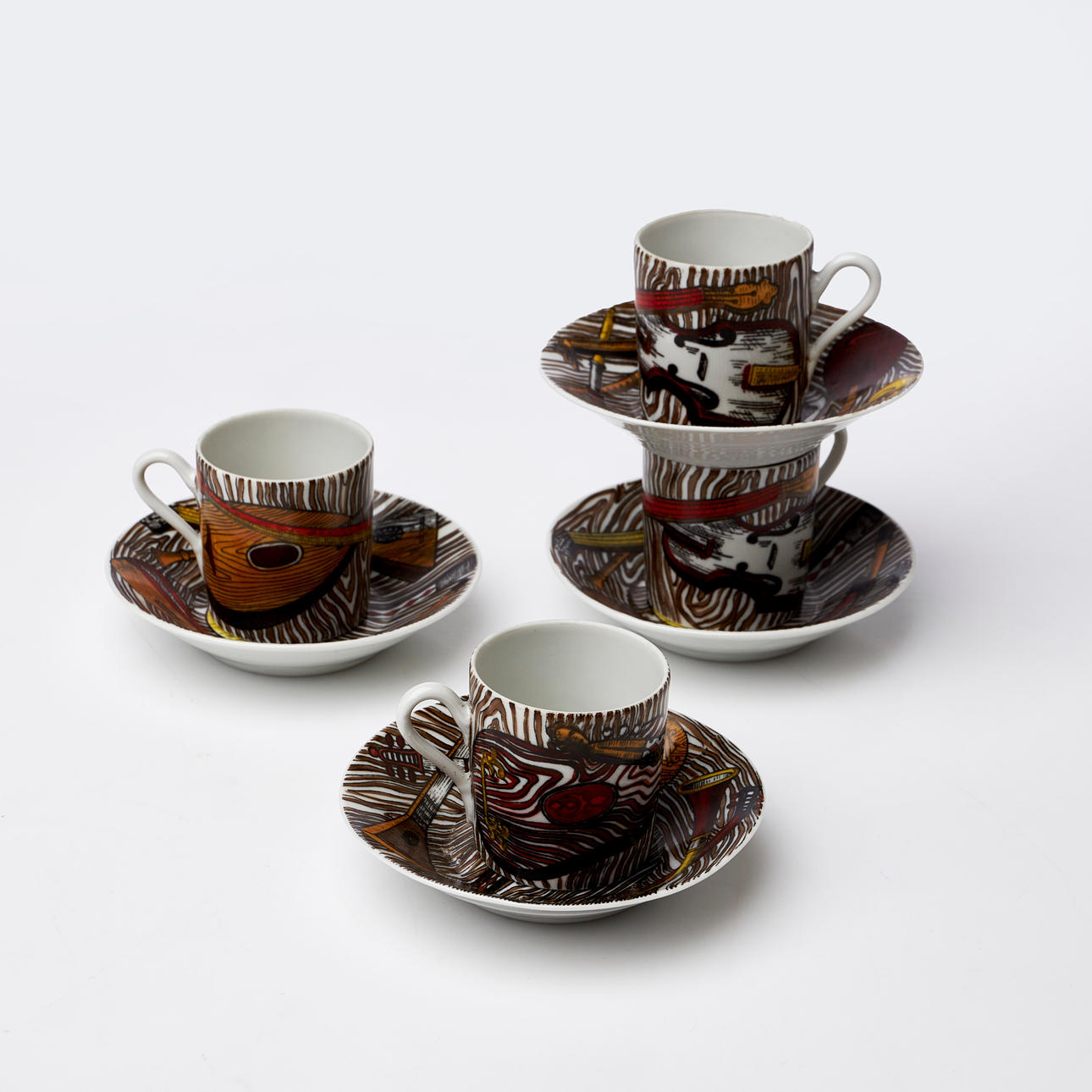 PIERO FORNASETTI. Mockakoppar med fat, 4 set, porslin, 