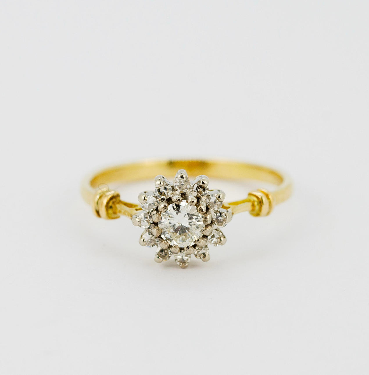 18 KARAT GULD DIAMANT SÆT TUSINDFRYD KLYNGERING.