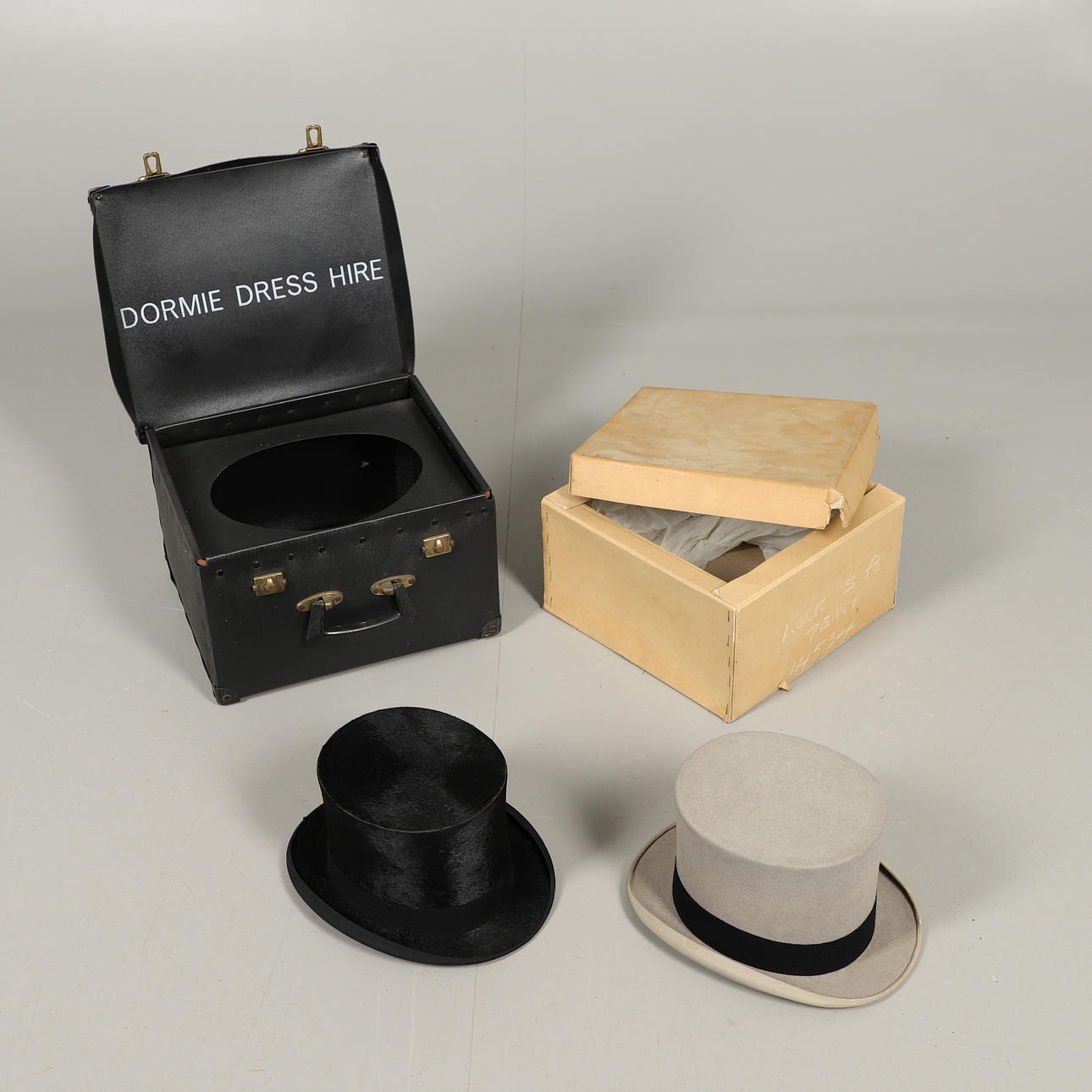 TWO MID-20TH CENTURY BOXED TOP HATS.