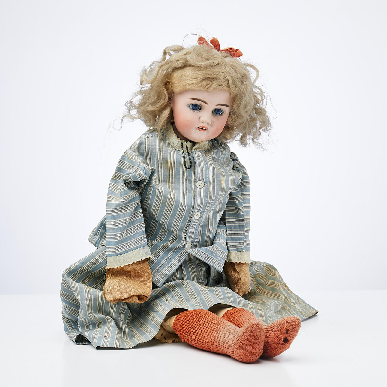 DOCK. Porcelain head, stuffed body.