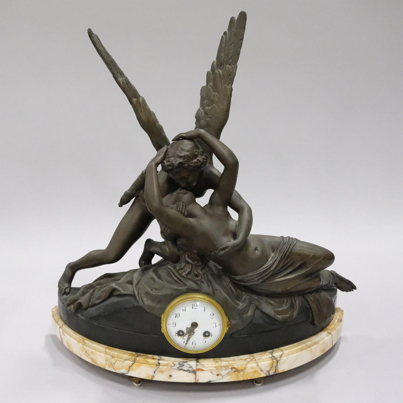 TABLE CLOCK PATINATED METAL, CUPID AND PSYCHE.