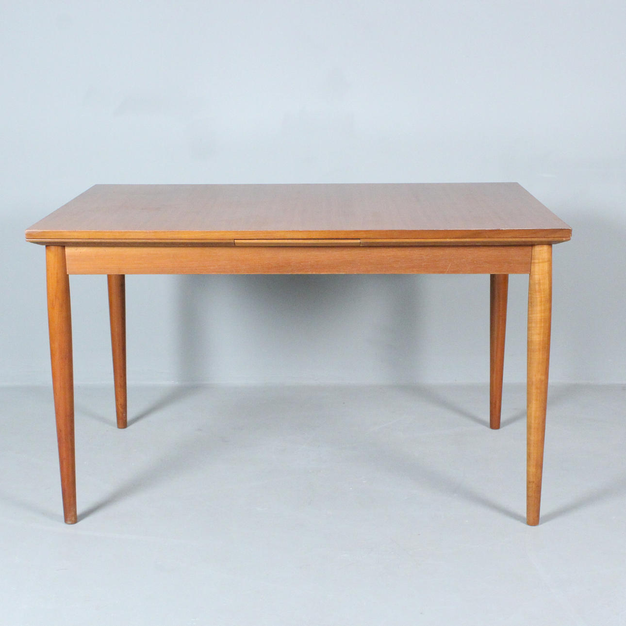 LÜBKE. Expandable dining table, 1960s.