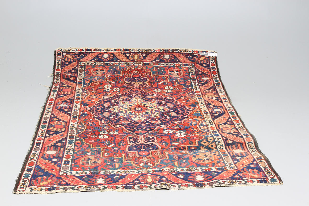 Handknuten matta, persisk 1900-tal.
