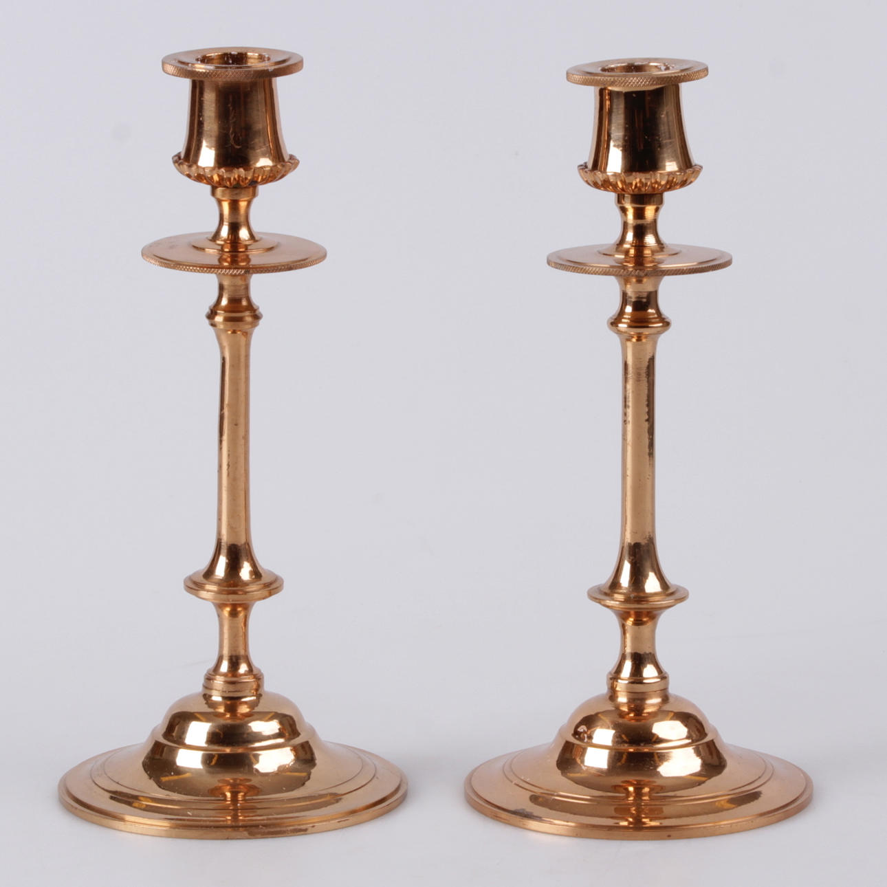 LJUSSTAKAR, ett par, malm, 1977.