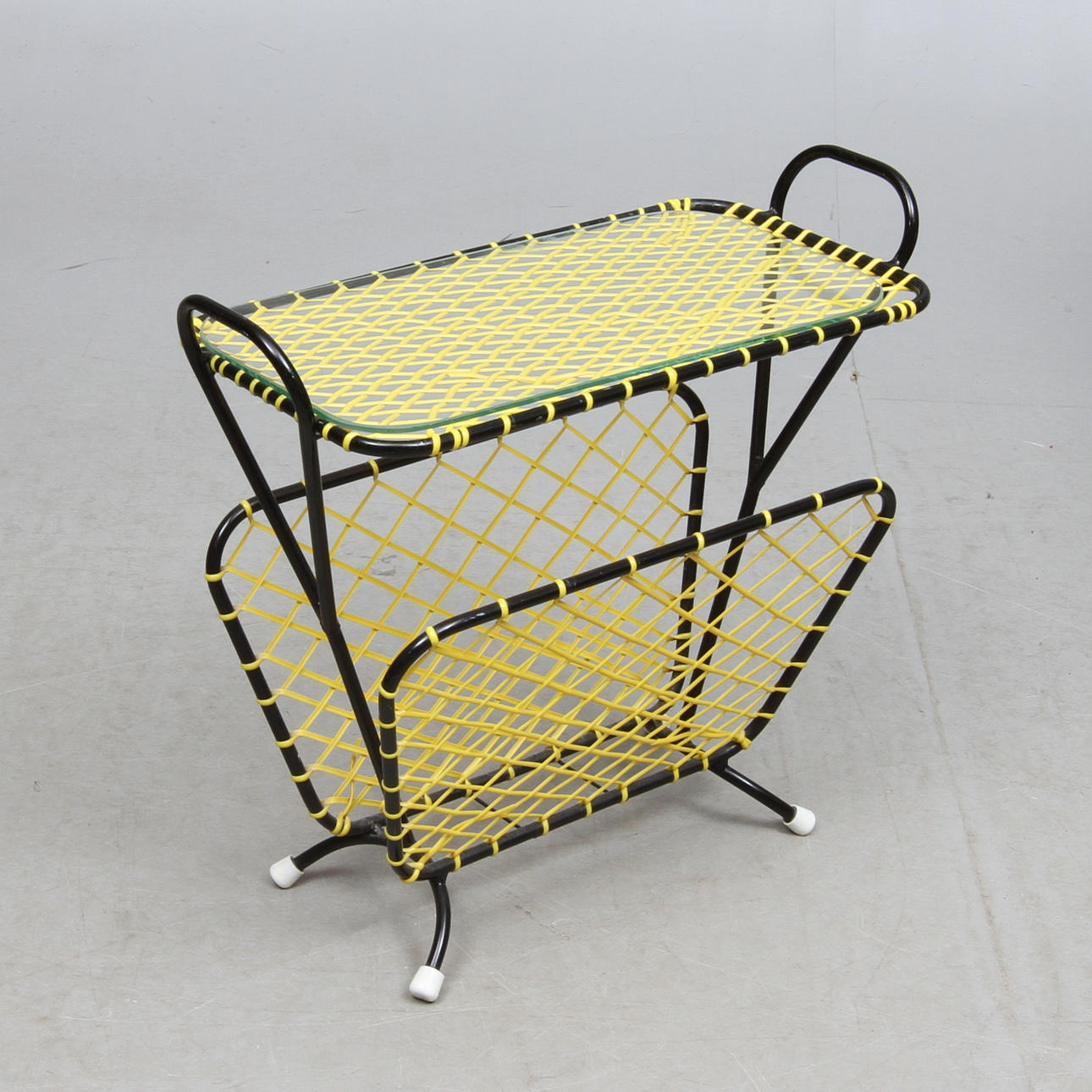 TIDNINGSSTÄLL, 1950-tal.