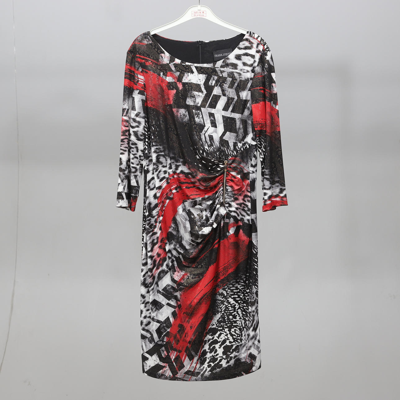 KLÄNNING, Frank Lyman.