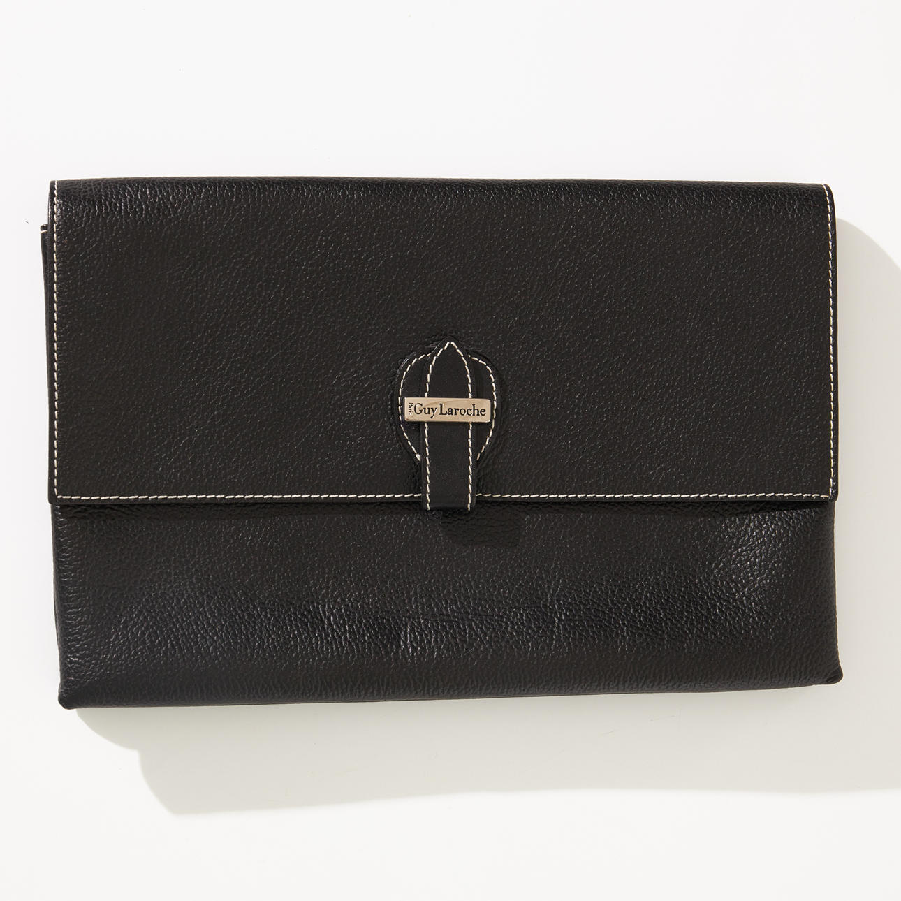 GUY LAROCHE, envelope bag, black embossed leather with white stitching, inside marked Guy Laroche, PARIS, 2 compartments, one with zipper, closes with push button.