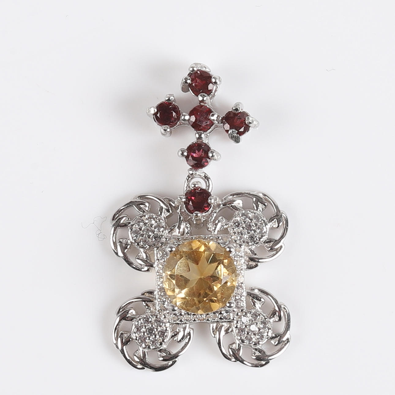 PENDANT, Sterling silver, Lemon quartz, Garnets.