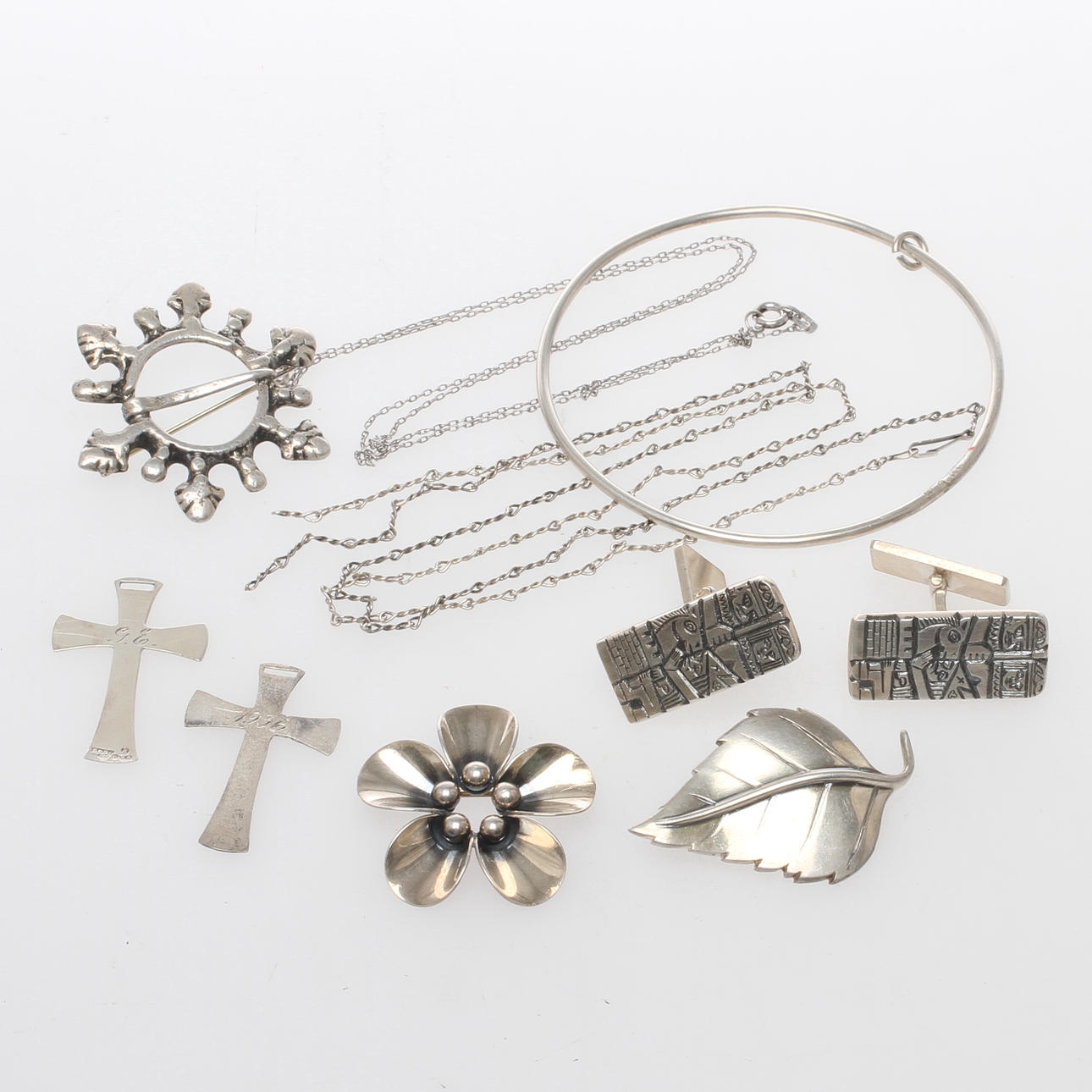 SMYCKEN samt MASCHETTKNAPPAR, 9 delar, silver, bl a B Sörling, 1900-tal.