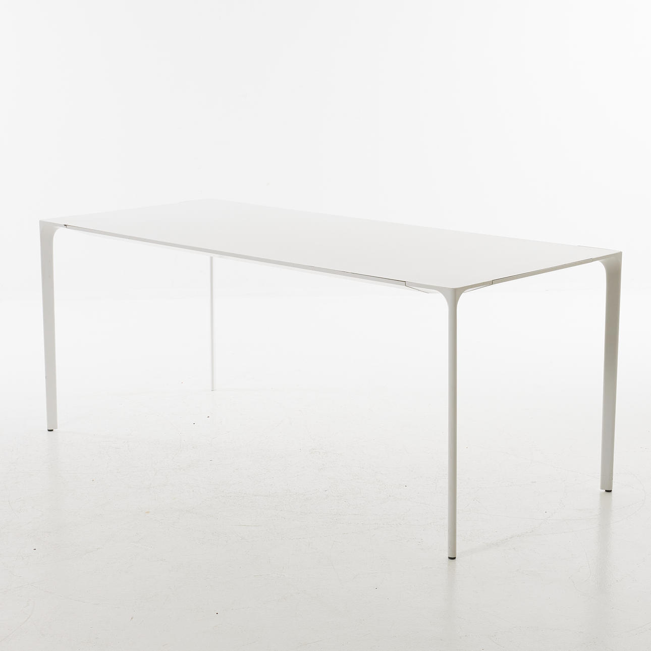 SIMON PENGELLY. “Nuur”, table, aluminium leg stand, laminate table top, white lacquered, for Arper, design 2009.