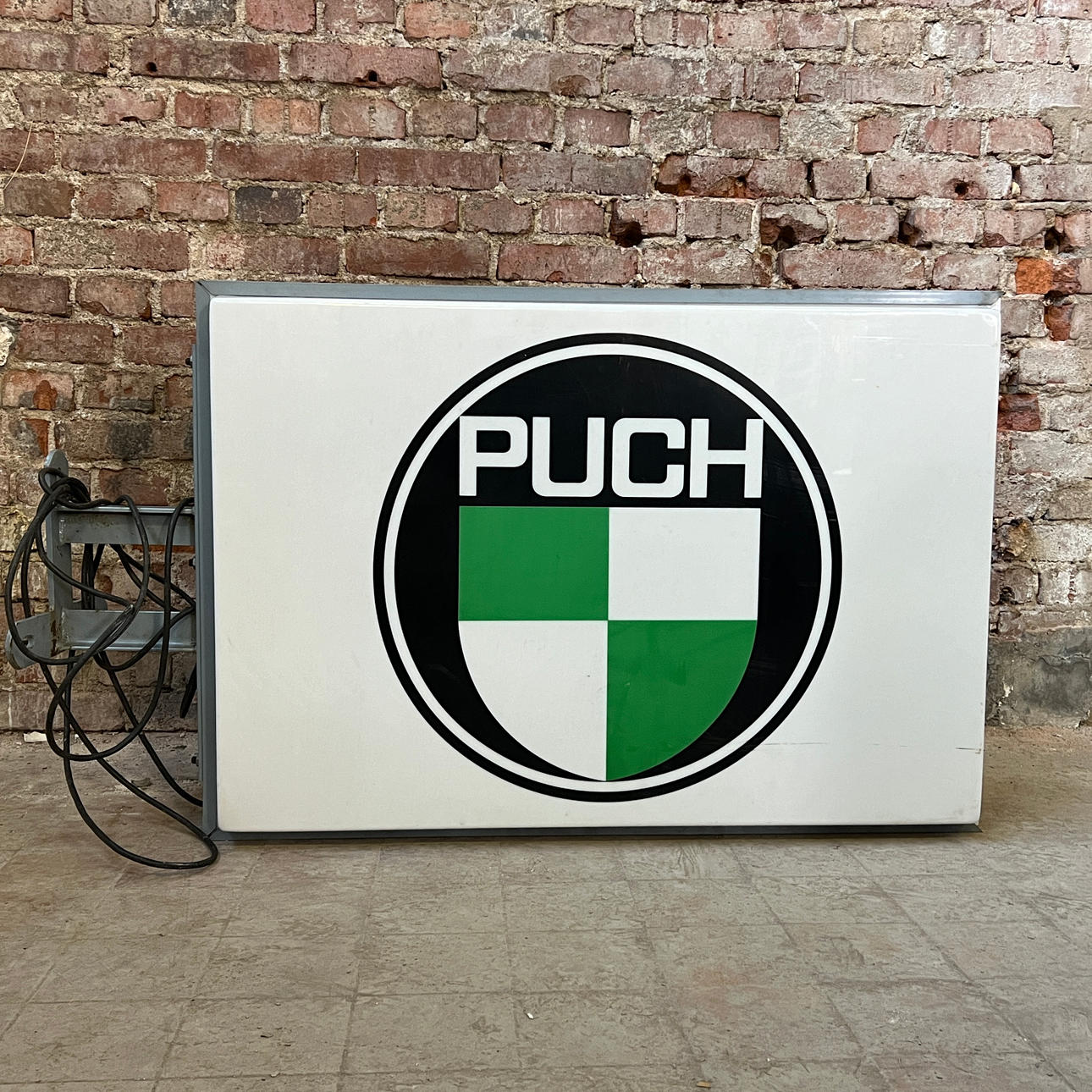 PUCH, plastic sign, illuminated, double-sided.