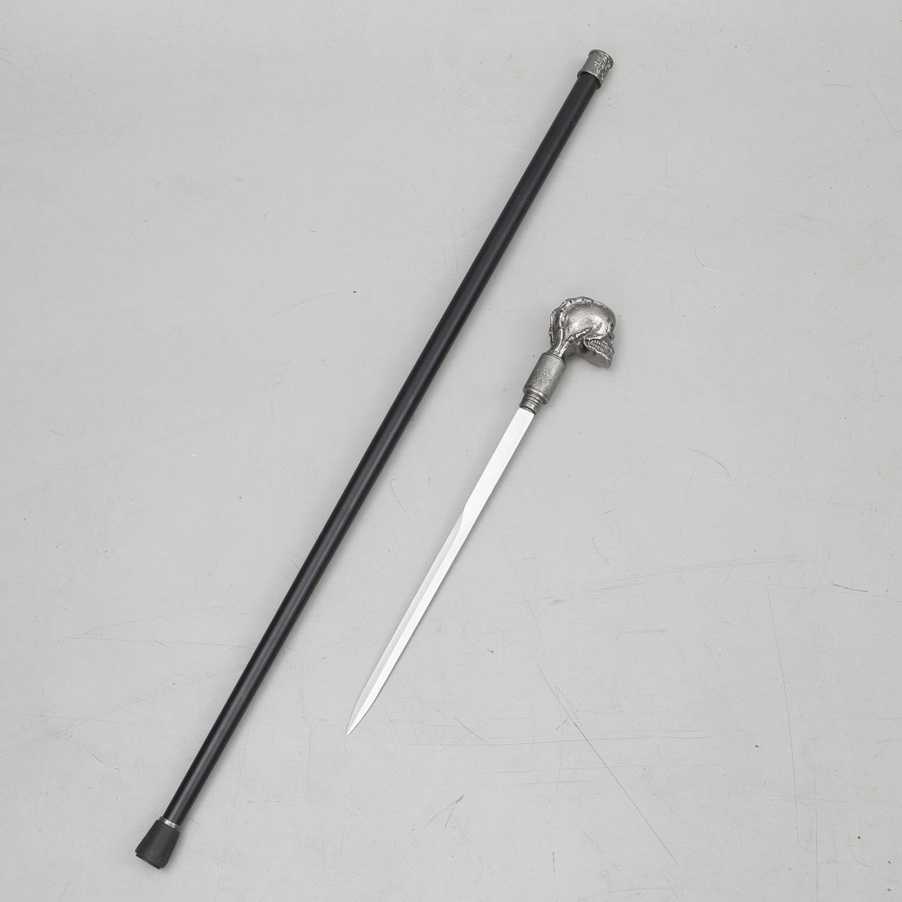 CANE with hidden dagger, metal skull.
