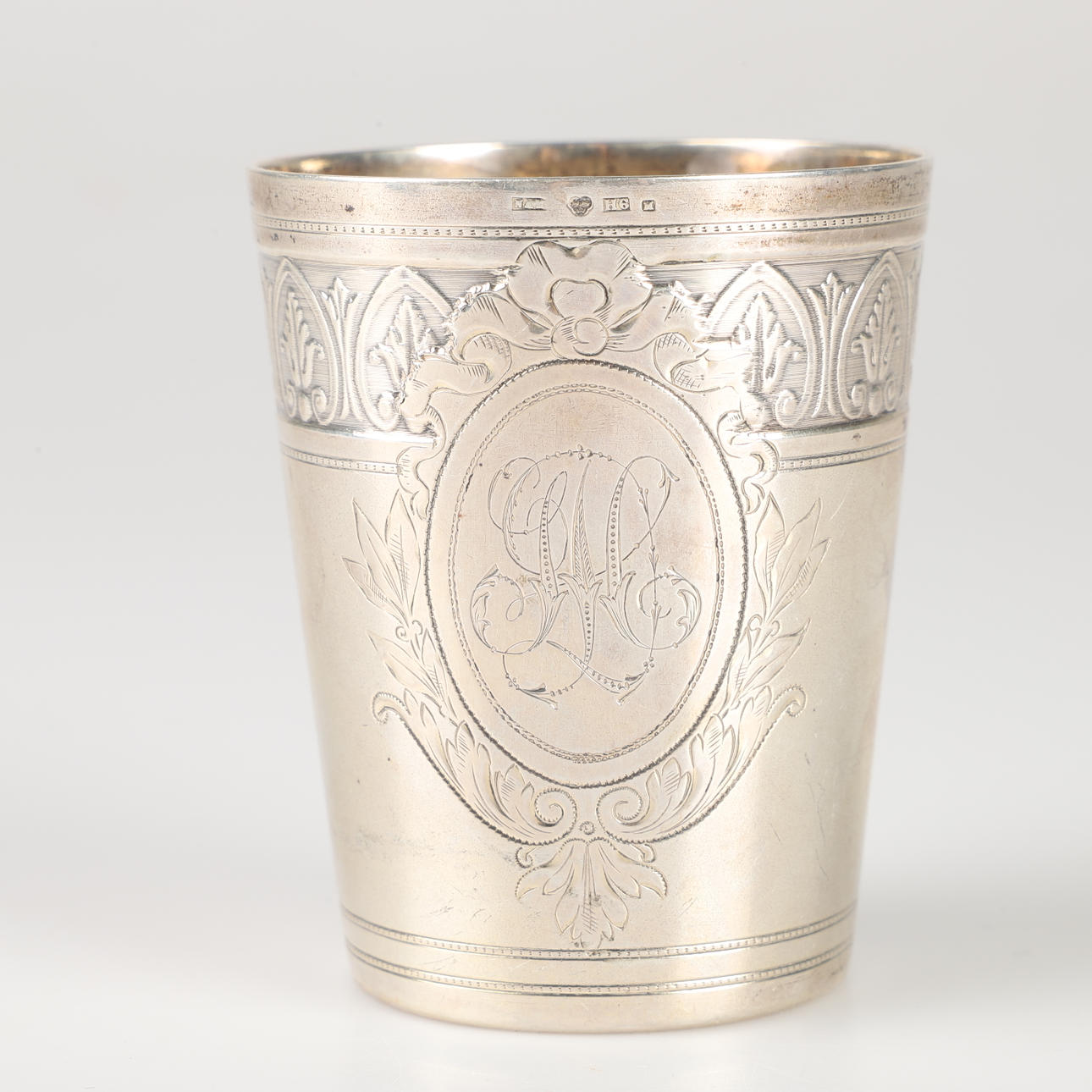 A SILVER BEAKER, NAM, 1886.