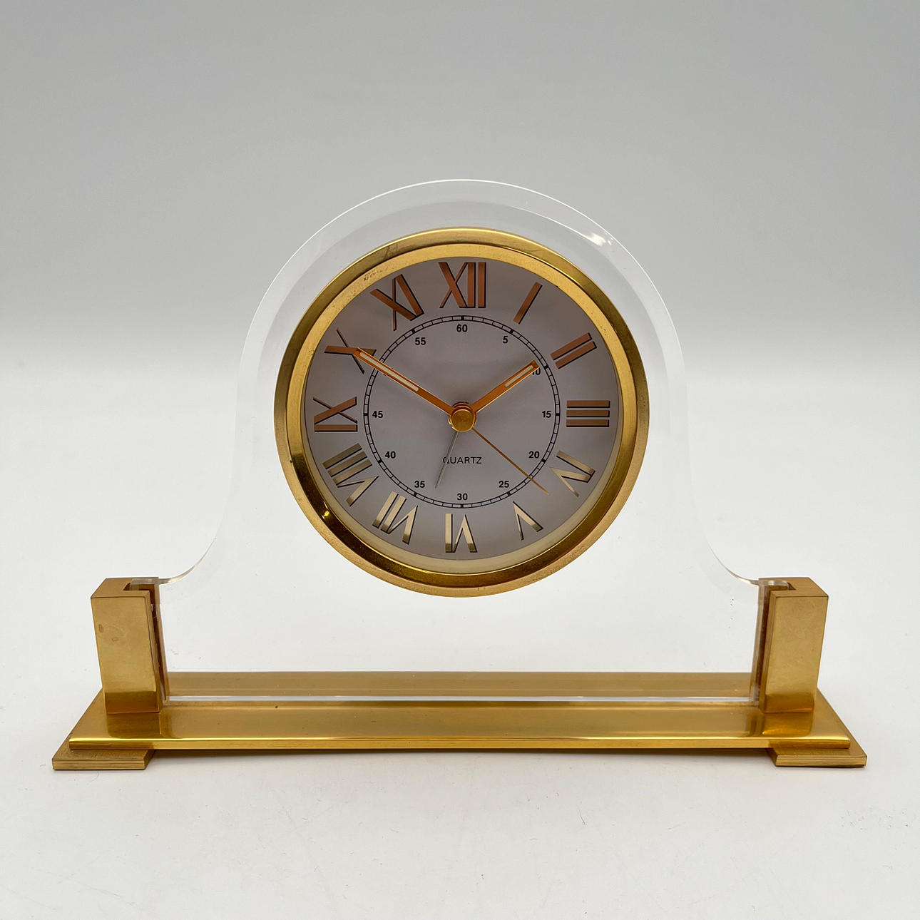 SMALL GOLD-COLORED TABLE CLOCK WITH ALARM CLOCK.