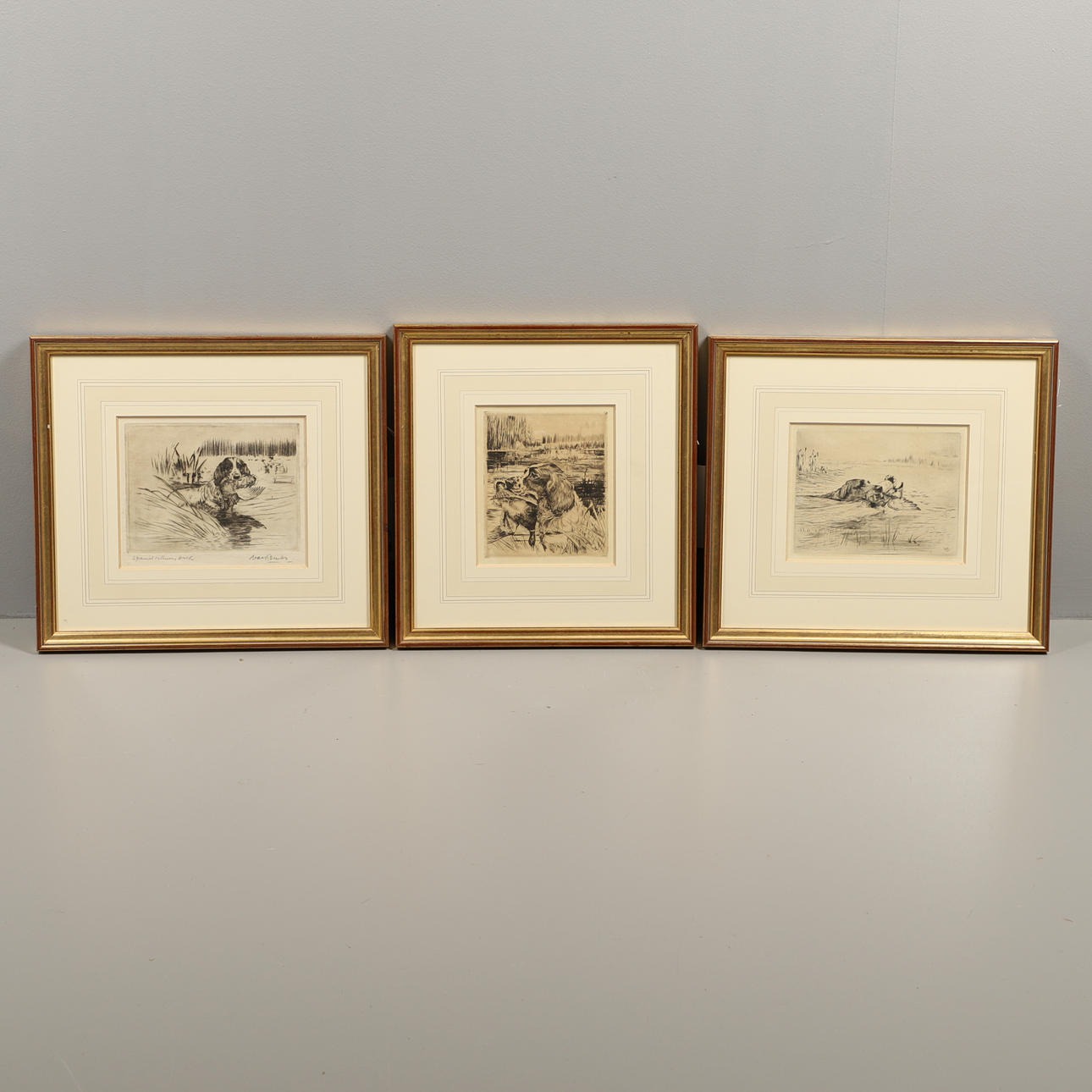 REUBEN WARD BINKS (1880-1950). SPANIEL RETRIEVING DUCK.