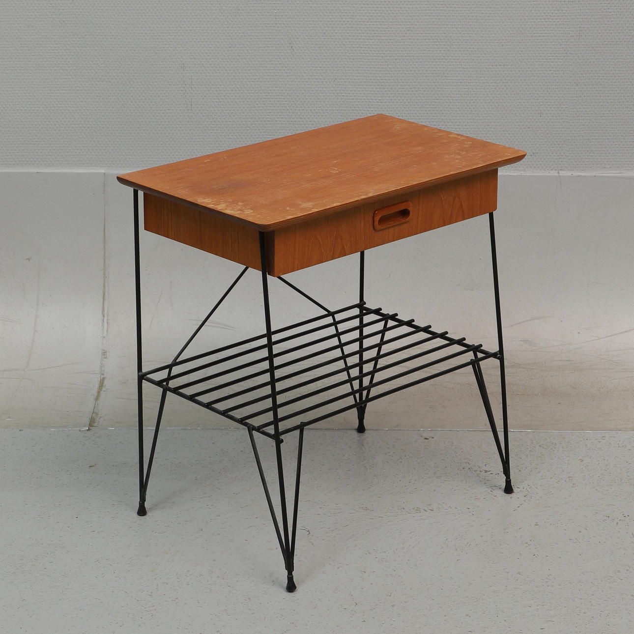 A teak telephone table, string, 1950s/60s.