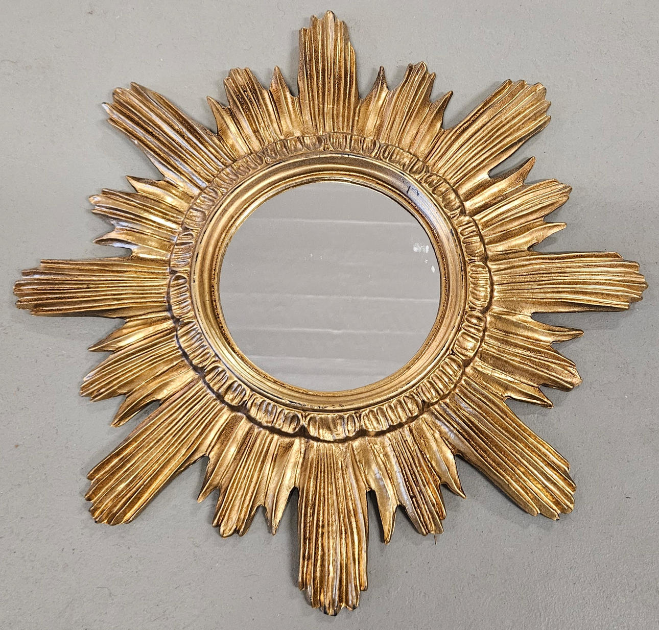 SUN MIRROR, glass, plastic. Made in Italy.