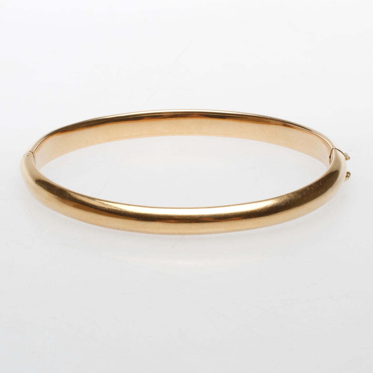 ARMRING, 18k guld, vikt ca 14 gr.