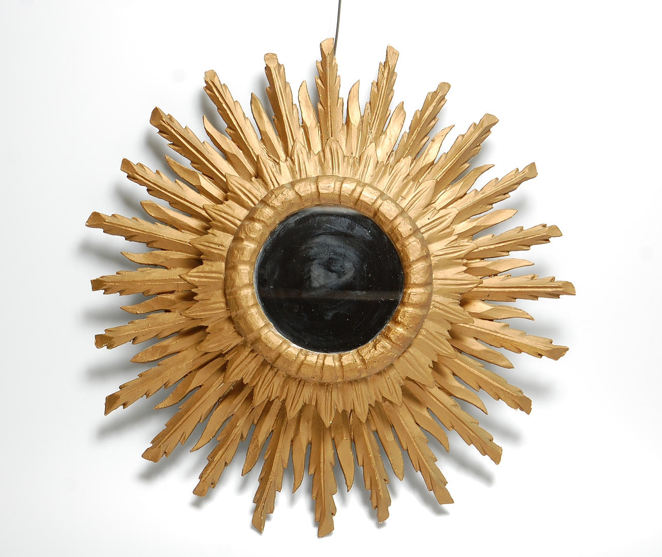 SOLSPEGEL, 1900-tal.