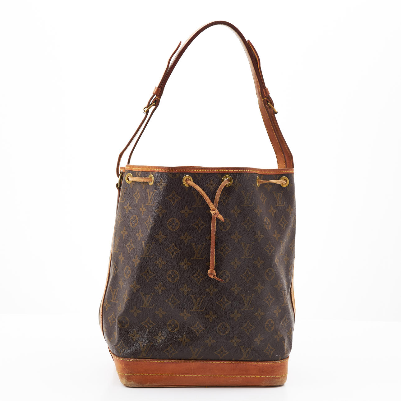 LOUIS VUITTON, “Something”, bucket bag, monogramcanvas, light leather details, adjustable shoulder strap, according to datecode 2001, marked LOUIS VUITTON PARIS, made in France.