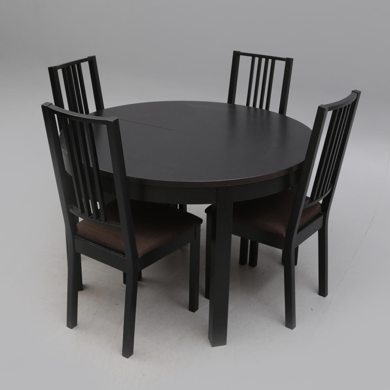 A 5-piece dining group, black, Ikea.
