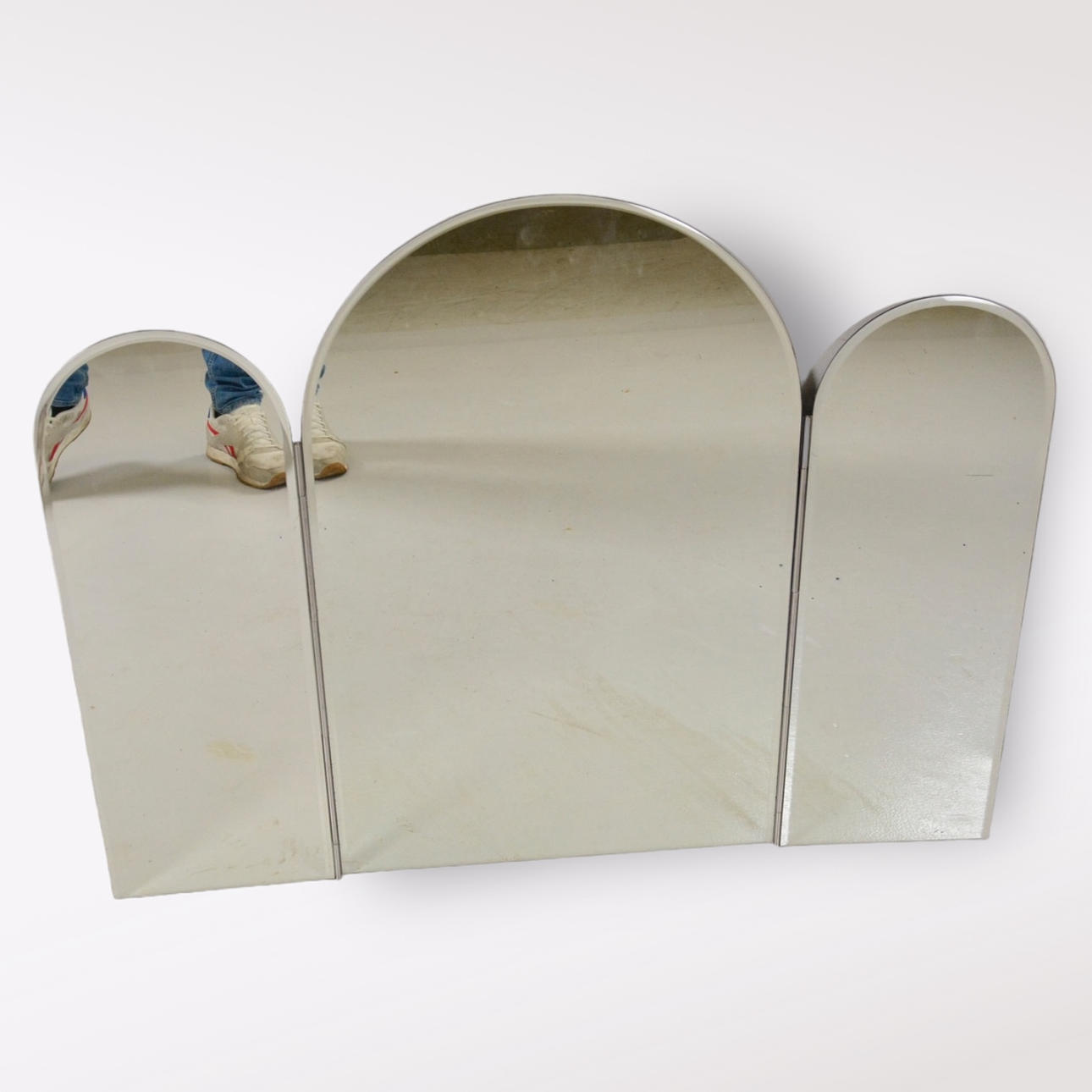 A fold-out mirror, 20th century.