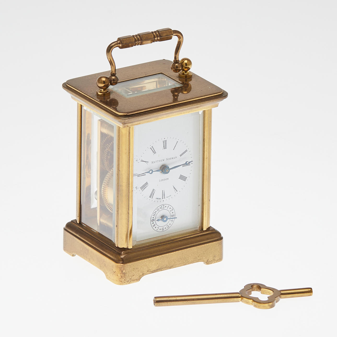 Matthew Norman, travel alarm clock/ alarm clock, brass