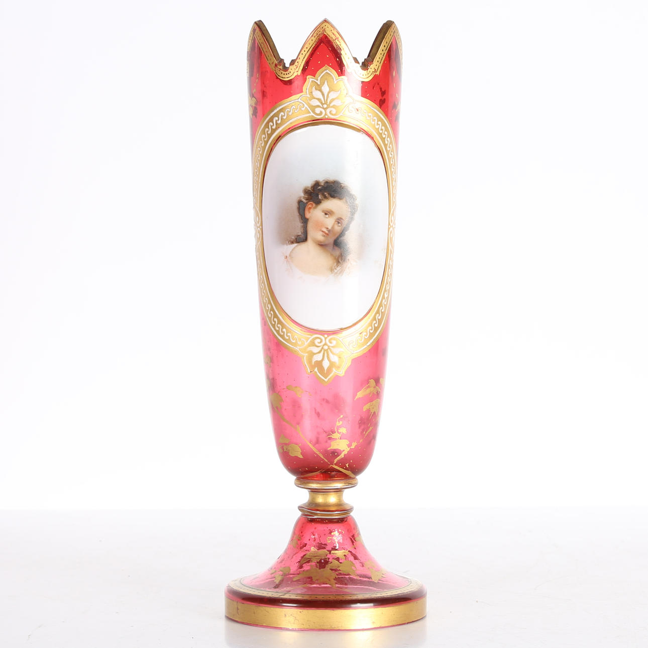 A 19TH CENTURY BOHEMIAN RUBY GLASS VASE.