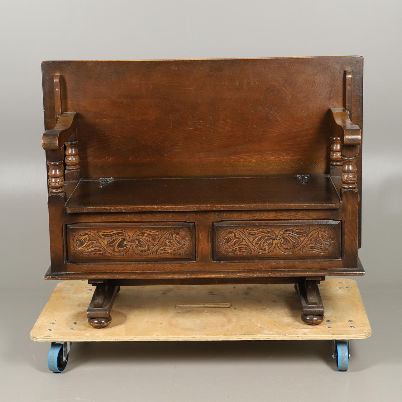 AN 'OLD CHARM' OAK MONKS BENCH.