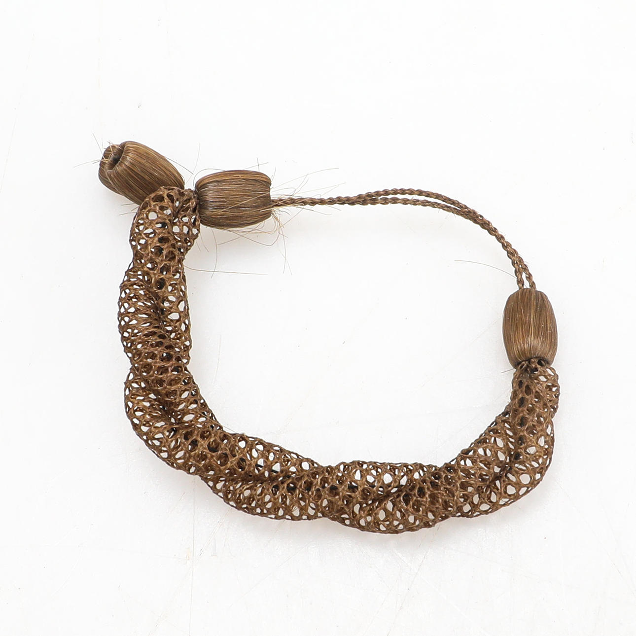 ARMBAND, hårarbete.