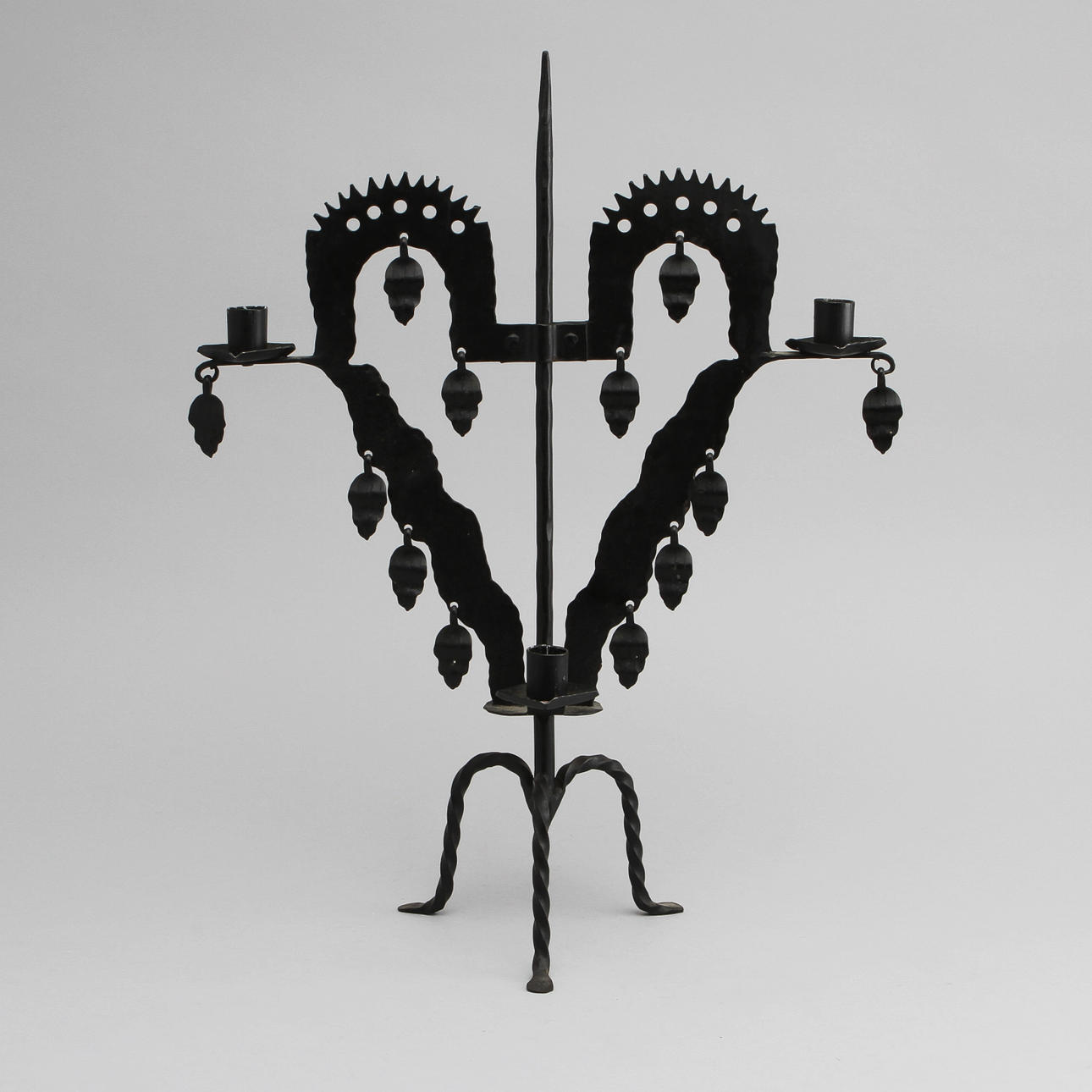 LJUSSTAKE, smide, 1900-tal.