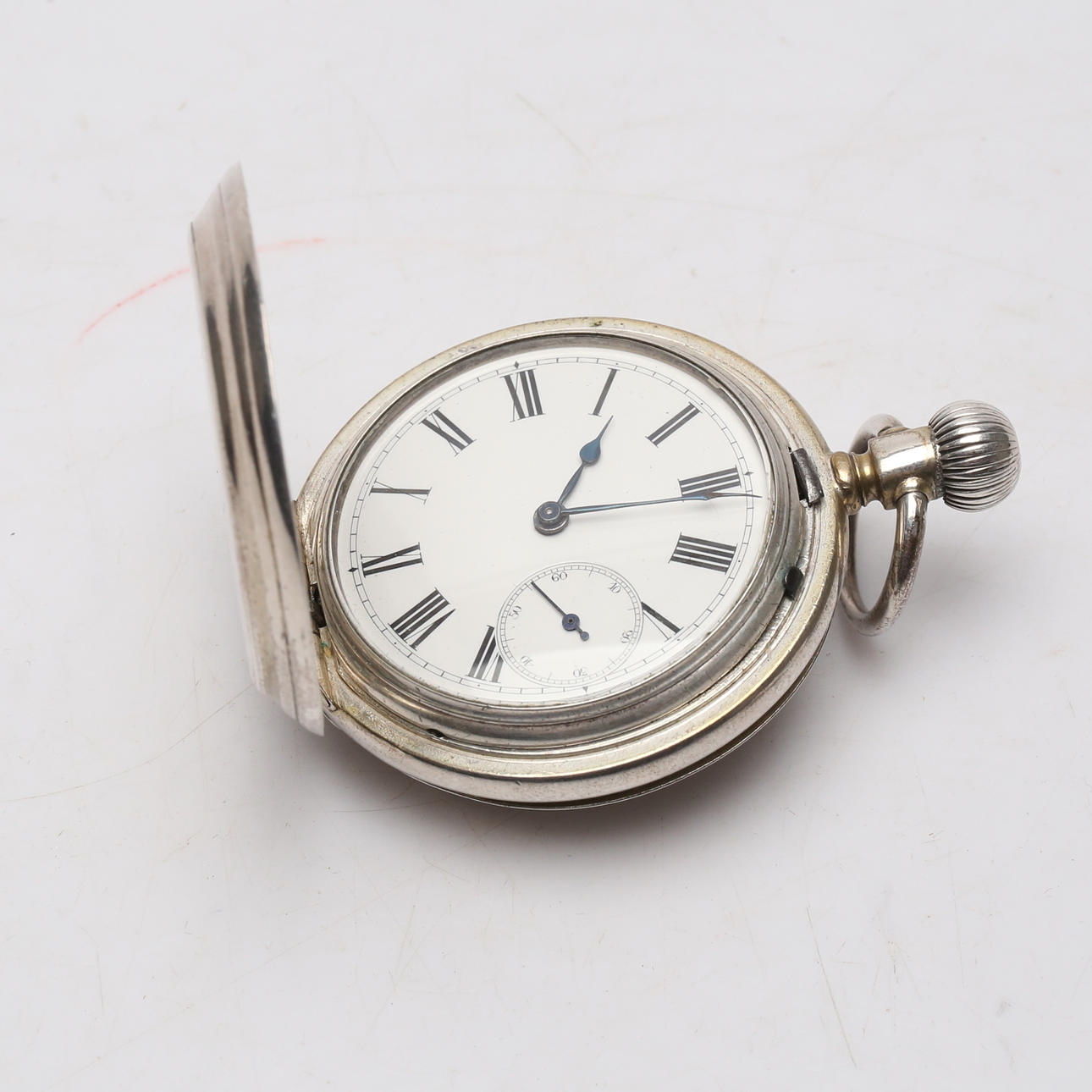 A white metal savonet pocket watch, Longines.