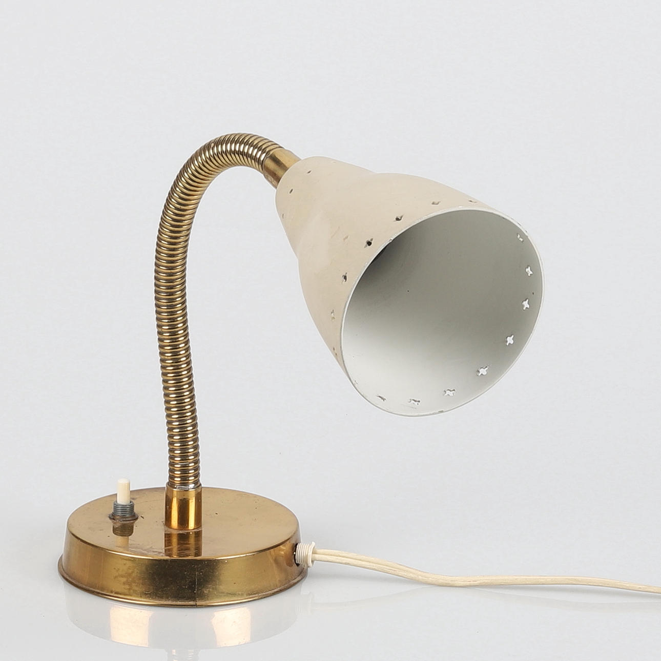 A metal table lamp, bendable, 20th century.