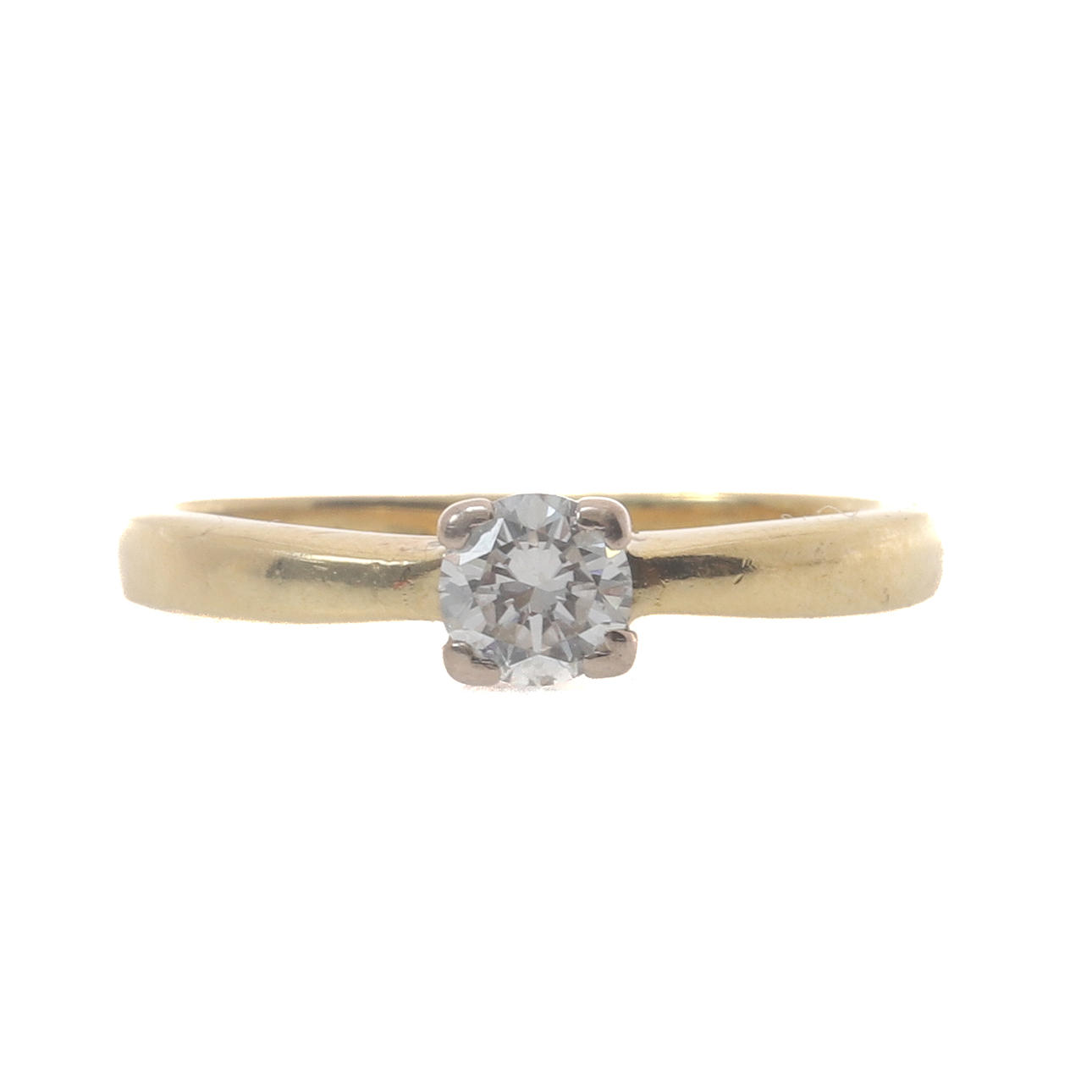 EN 18 KARAT GULD SINGELSTEN DIAMANTRING.