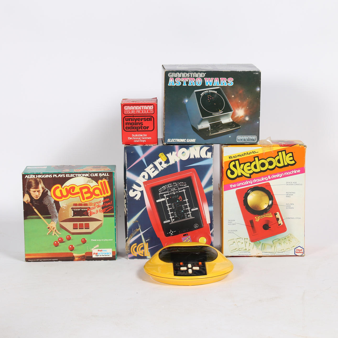 A COLLECTION OF RETRO HANDHELD GAMES.