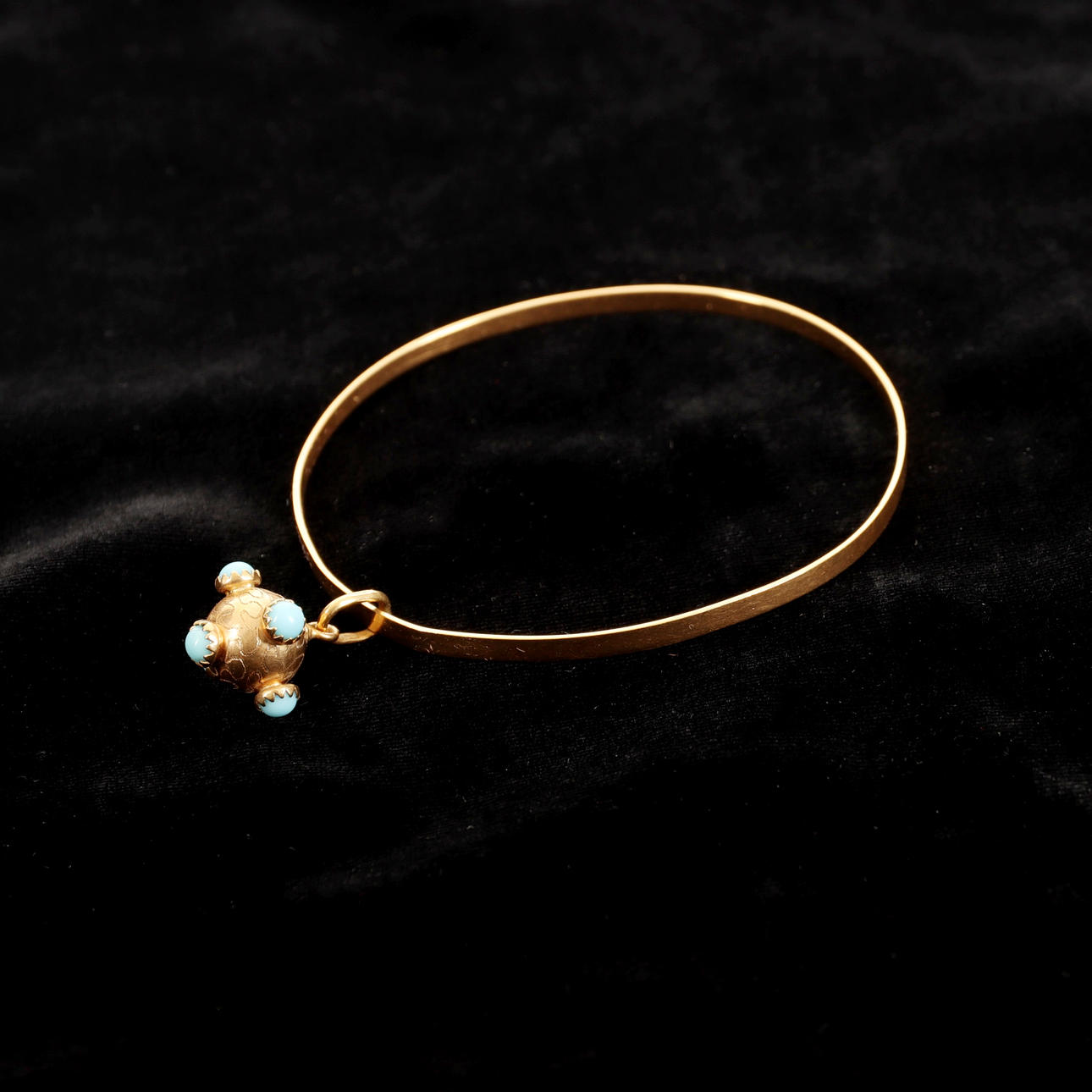 ARMBAND MED BERLOCK, 18K guld, 1965.
