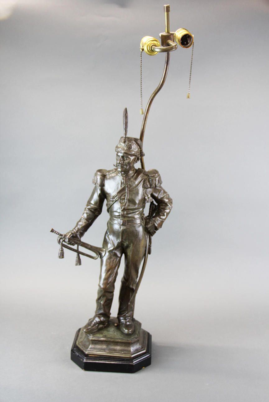 BRONZE SCULPTURE MOUNTED AS LAMP BASE.