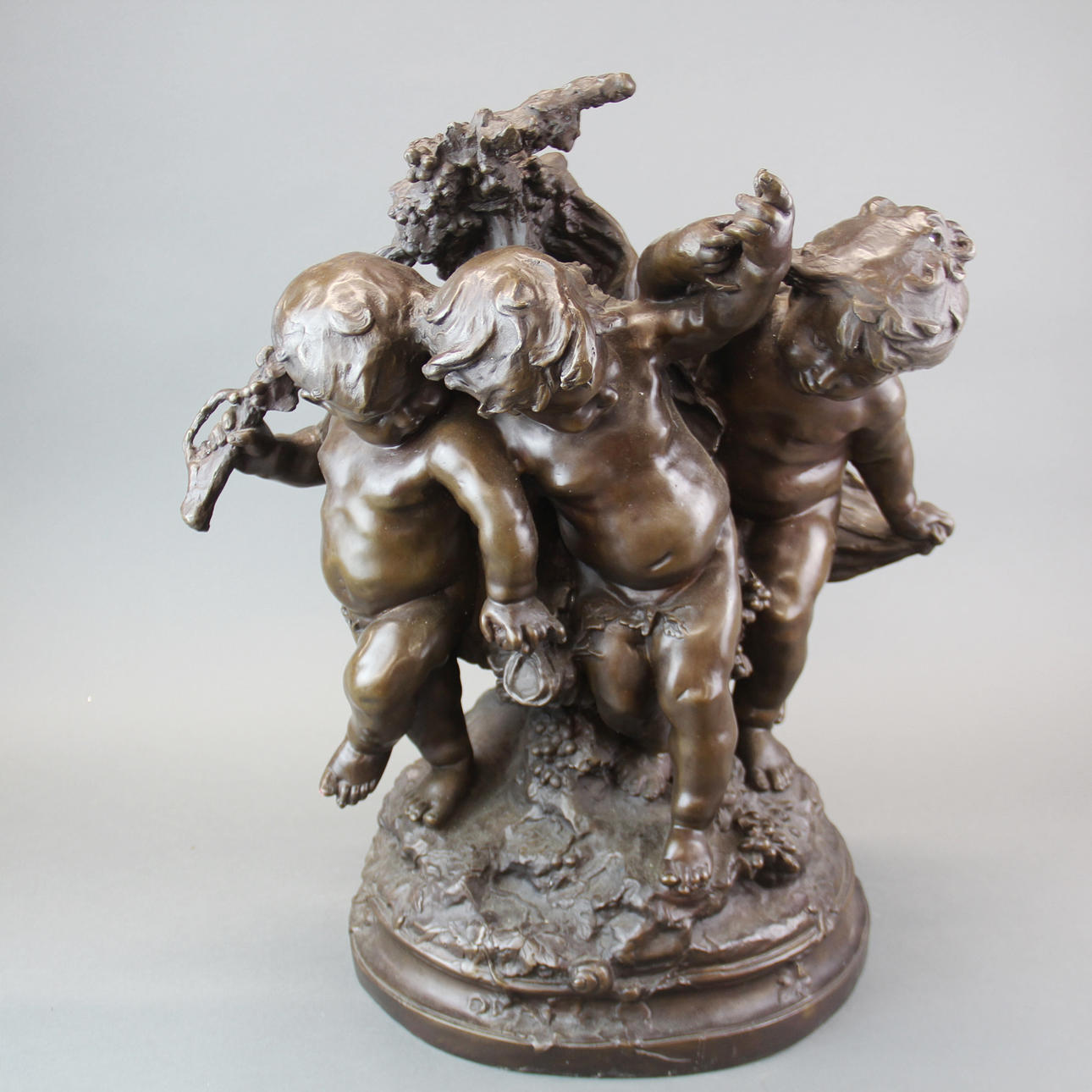 BRONZE PUTTI SCULPTURE.