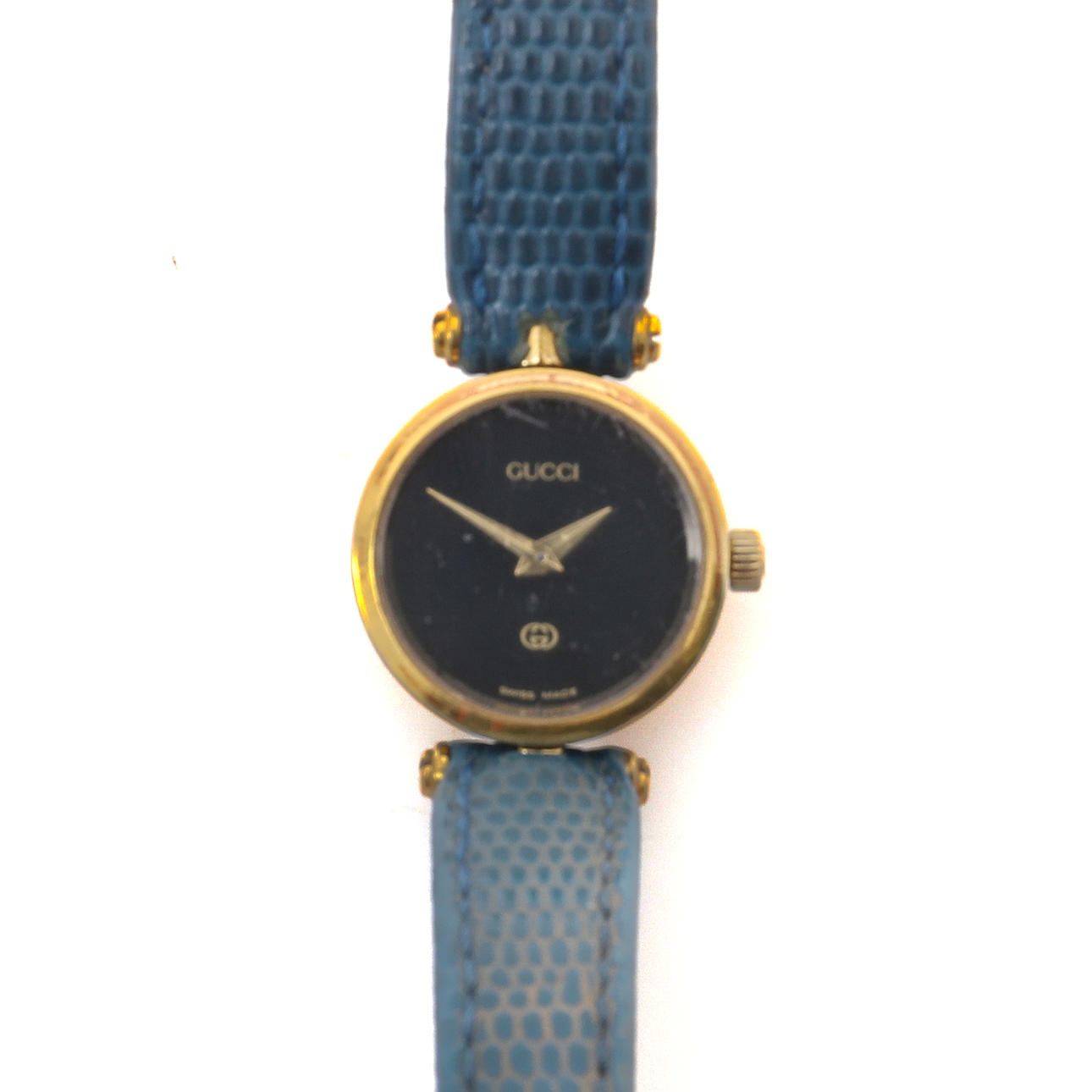 GUCCI: UN RELOJ DE PULSERA CIRCULAR PARA MUJER.