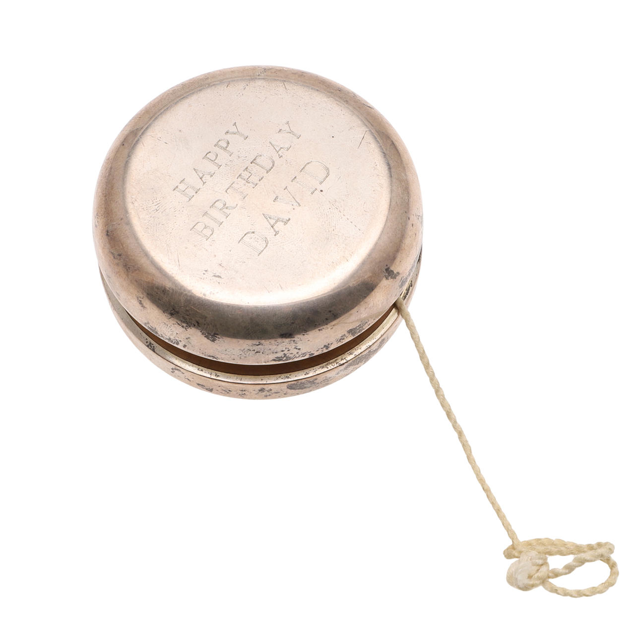 TIFFANY & CO. A SILVER MOUNTED WOODEN YO-YO.
