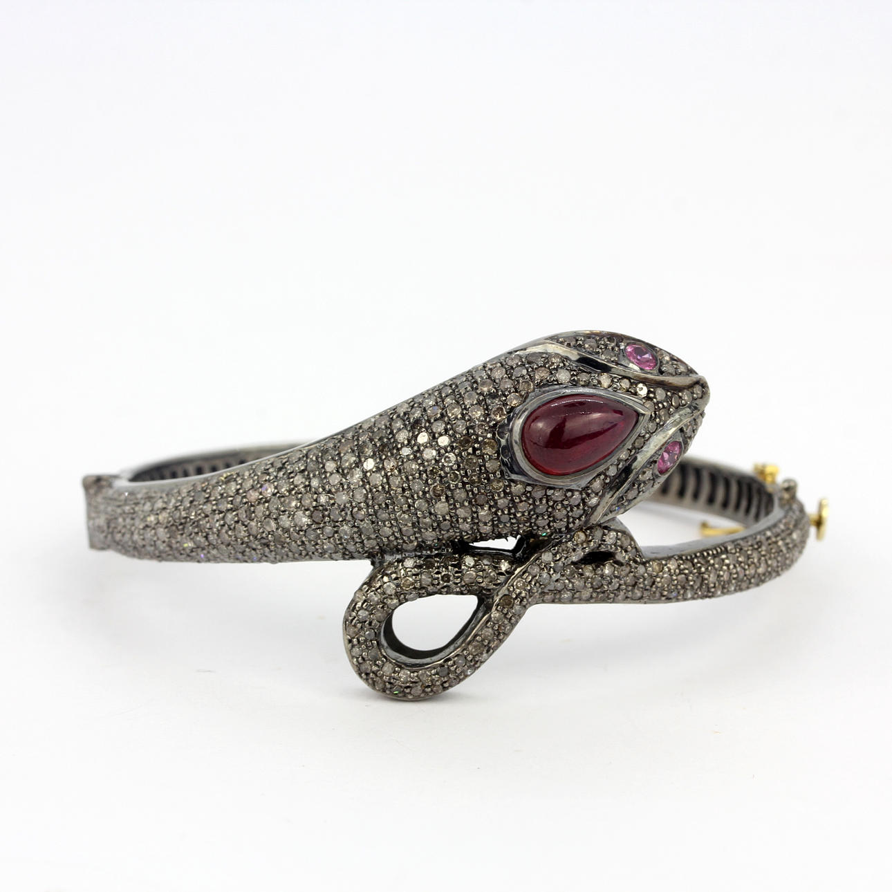 DIAMOND, RUBY AND PINK SAPPHIRE SNAKE BANGLE.