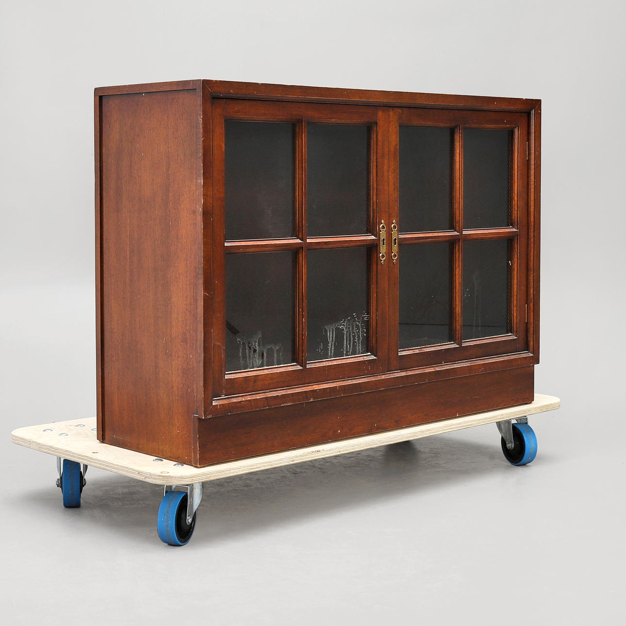 DISPLAY CABINET, mahogany veneer with interior lighting.