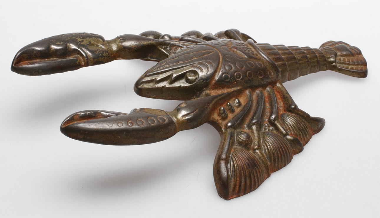 STÖVELKNEKT i form av kräfta. Järn, England. 1900-talets andra hälft.