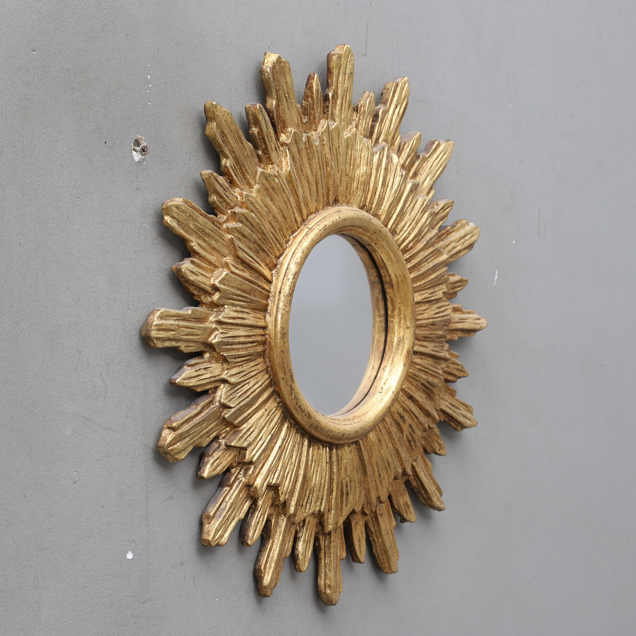 Solspejl, plast, 21. århundrede.