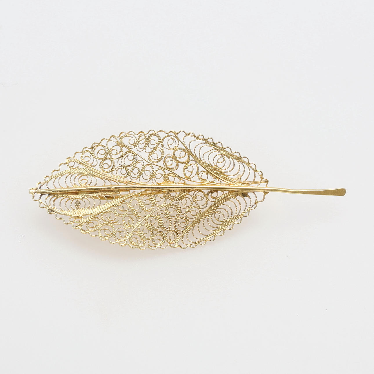 BROCHE EN FORMA DE HOJA.
