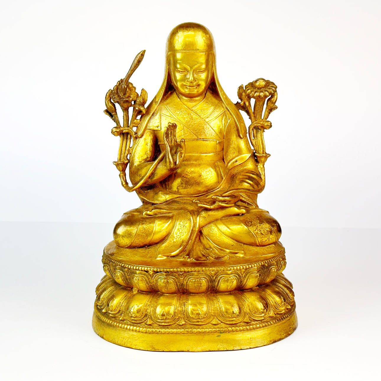 FIGURA DE LAMA TIBETANO SENTADO.