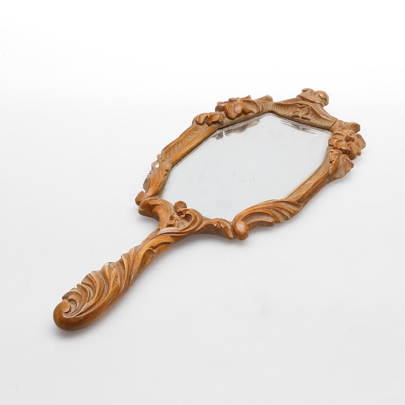 ERIK REIMHULT. Handspegel. Signerad.