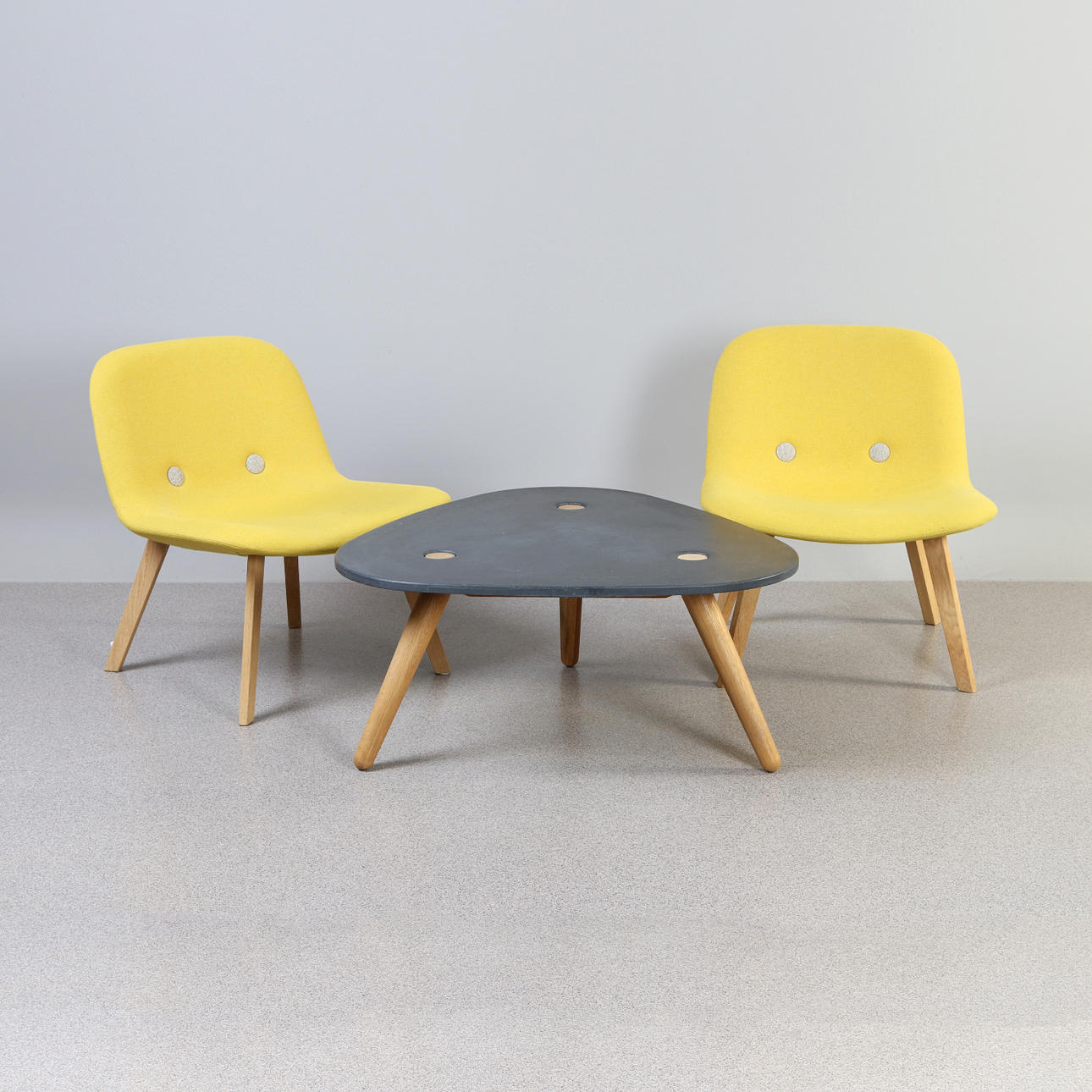 ERIK JØRGENSEN. ARMCHAIRS, A COUPLE AND A TABLE. Oak with textile upholstery, molded table top. “Eyes Lounge”, designer Foersom & Hiort-Lorenzen.
